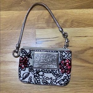 Mini coach wristlet in poppy print